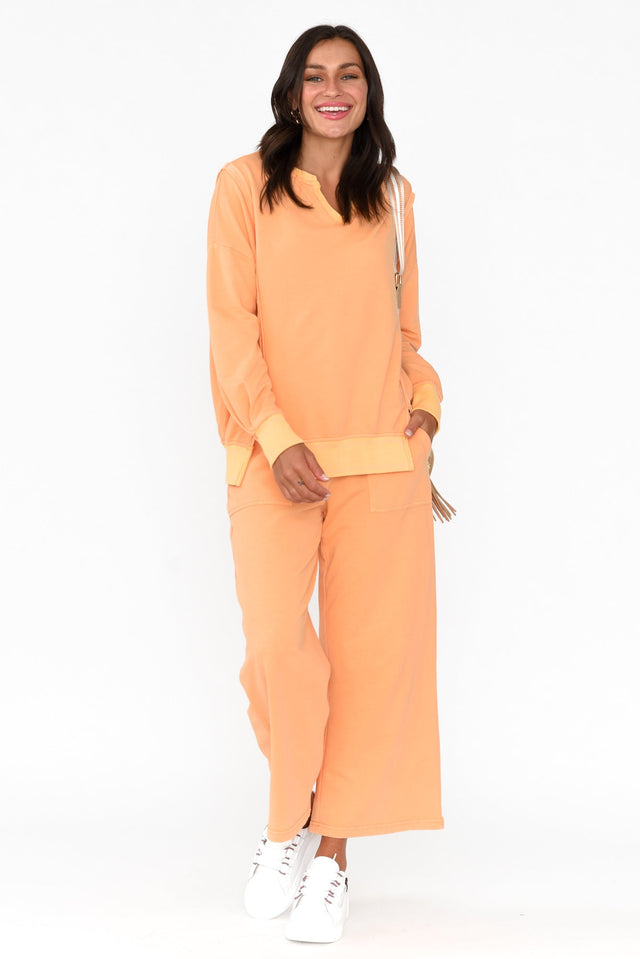 Mariam Orange Relaxed Track Pants banner image