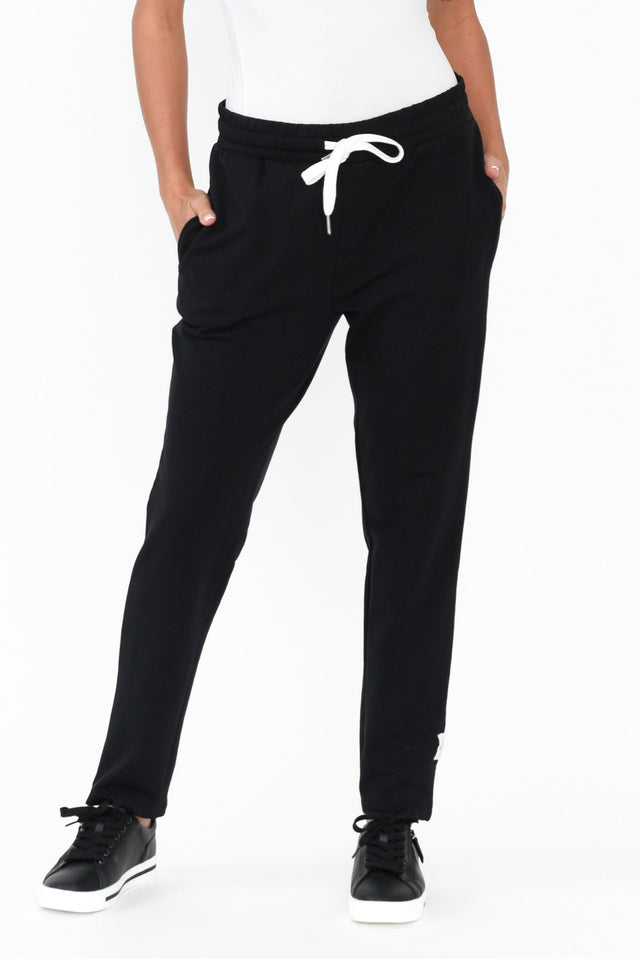 Lobby Black Cotton Relaxed Pants length_Full rise_Mid print_Plain colour_Black PANTS   alt text|model:Brontie;wearing:US 4 image 1